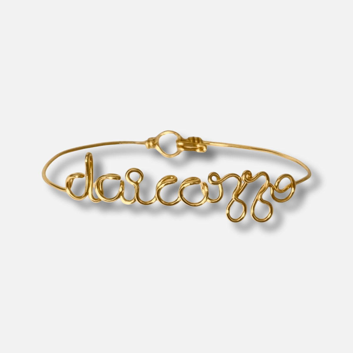 Bracciale Mantra con una frase in corsivo, nel colore oro — Trame gioielli