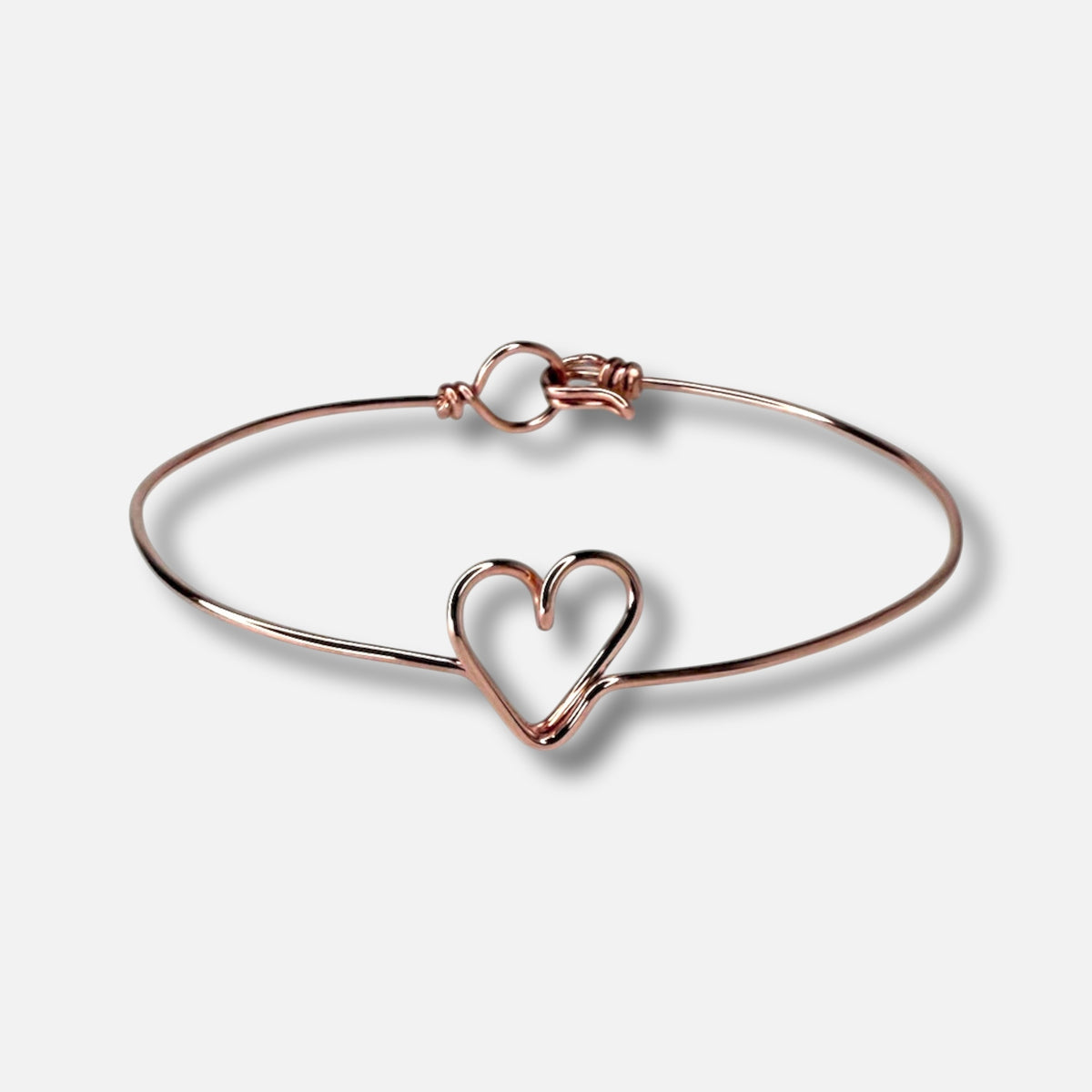Bracciale Sottovoce con il cuore al centro, nel colore oro rosa — Trame gioielli