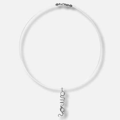 Collana Apostrofo, ciondolo in argento 925 su filo trasparente — Trame gioielli