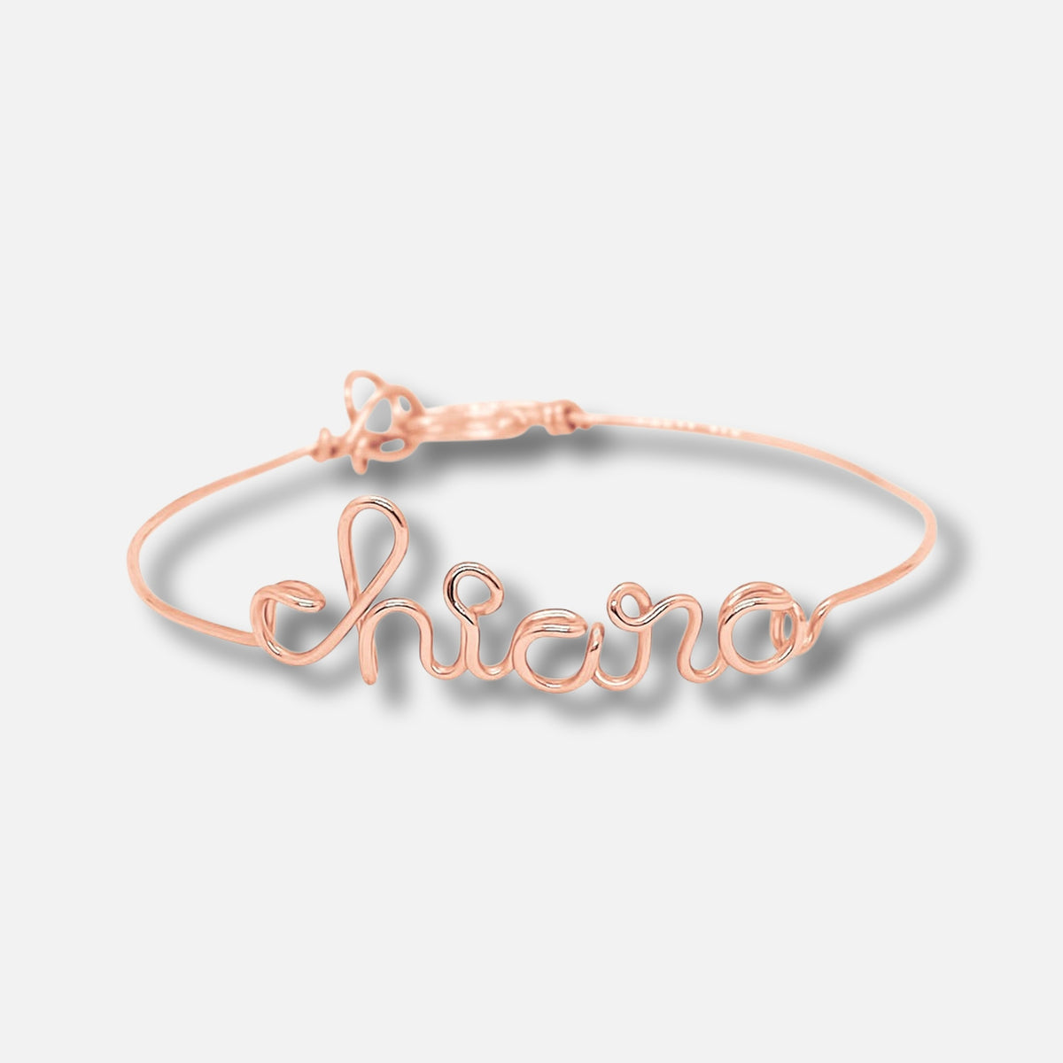 Bracciale Tratto con una parola in corsivo, nel colore oro rosa — Trame gioielli