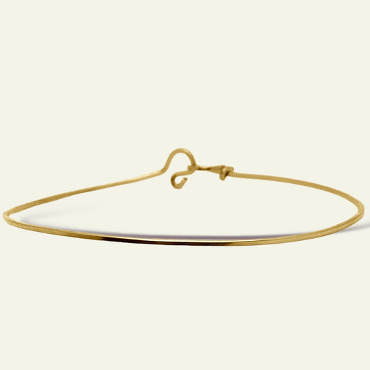 bracciale in filo quadrato d'oro giallo rigido